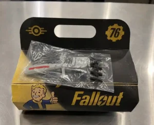 Fallout-themed meal box with collectible toy in a clear plastic bag