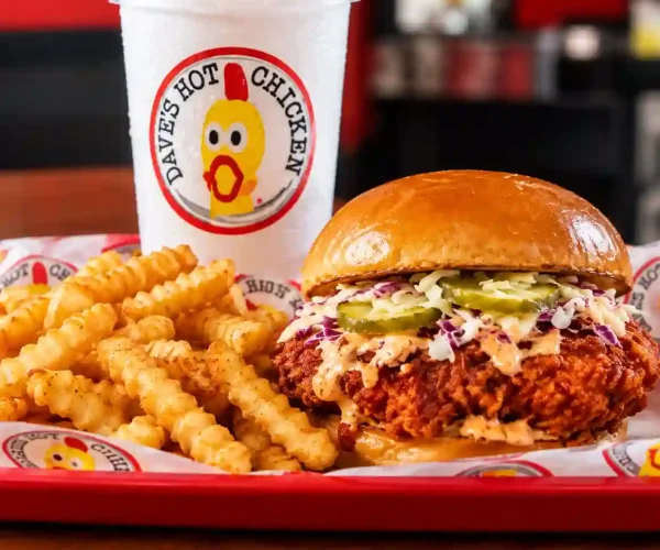 Dave’s Hot Chicken Canton menu with a crispy chicken slider, fries, and drink