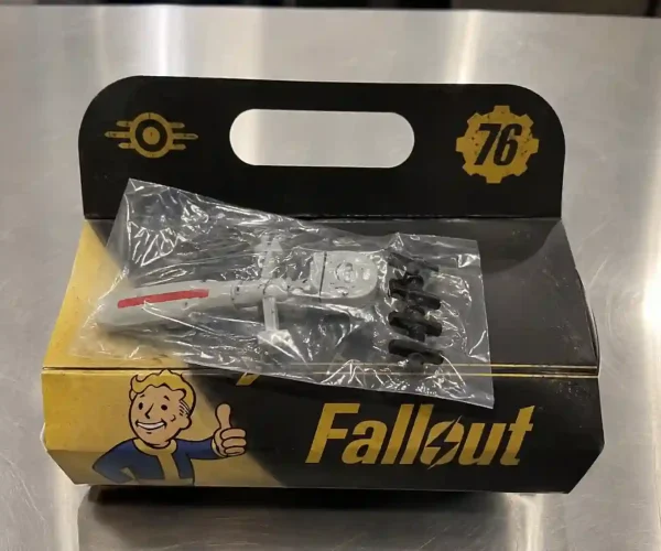 Fallout-themed meal box with collectible toy in a clear plastic bag